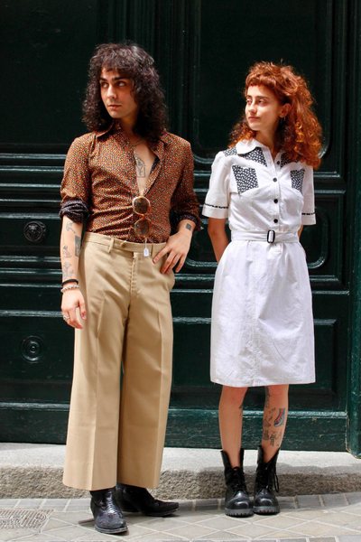 two young persons wearing vintage outfits in Madrid