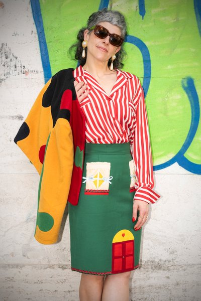 Elisa Ferrarini, 44, in a colorful vintage Moschino look
