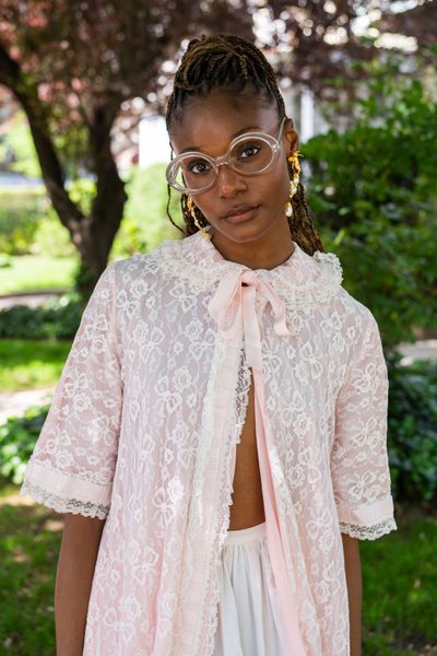 Camri Hewie in a feminine pink vintage outfit