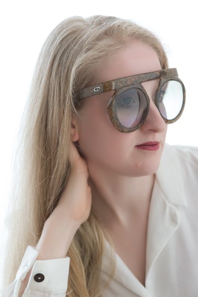 A woman wearing statement vintage Gucci frames.