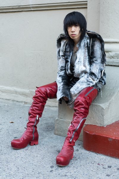 Kendrick Quek, 25, aka Grailed seller Kendricky in Rick Owens AW19 Larry Silver Zionic jacket & Rick Owens dick flap tank top and Saint Laurent leather shorts & Rick Owens SS20 red leather ballast thigh high boots