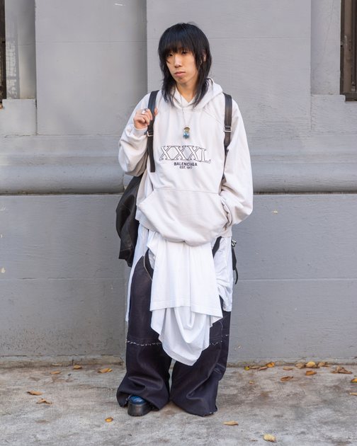 Kenricky wearing Balenciaga XXXL hoodie combo from AW22, Per Gotesson Black bird pants from Rick Owens AW16, and Hood by Air centaur cut out boots