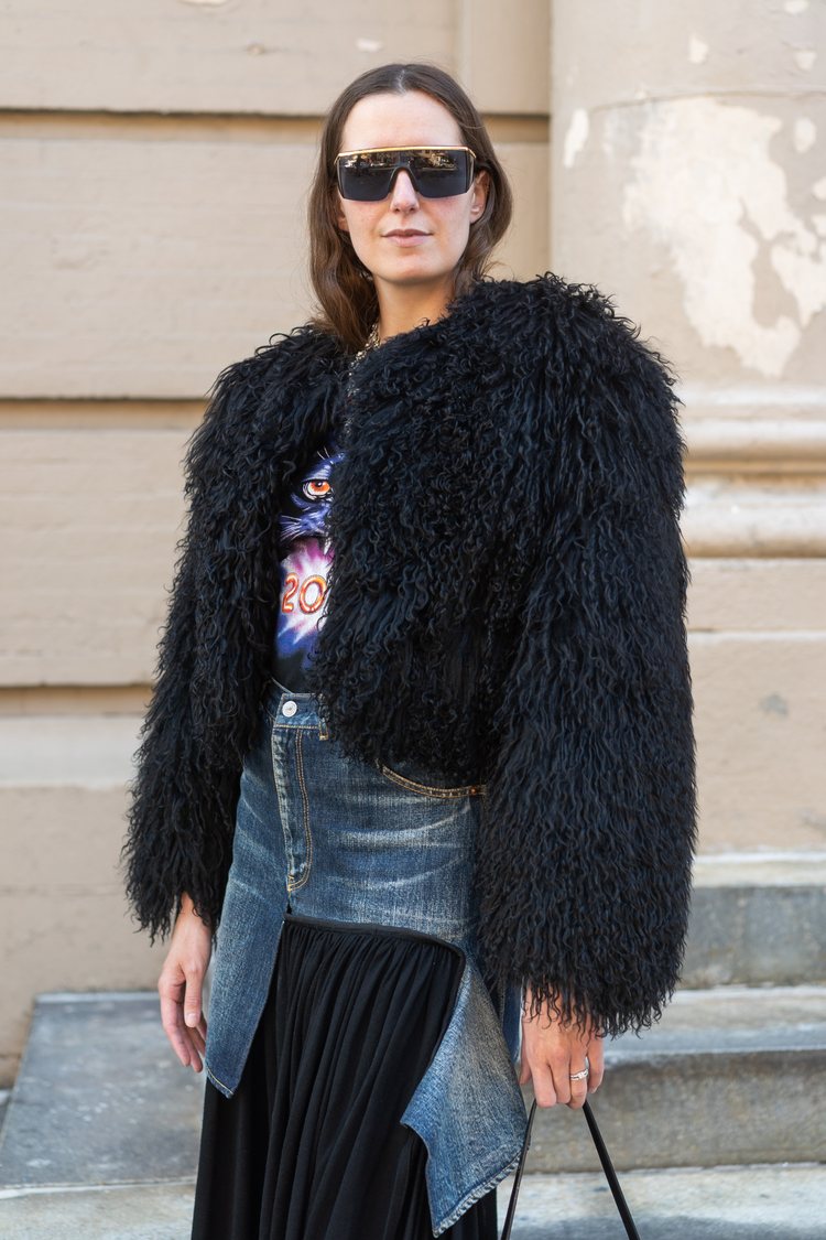 Owner of Nina Gabbana Vintage, Marie Laboucarié, wearing a 90s Patrick Kelly black vintage jacket.