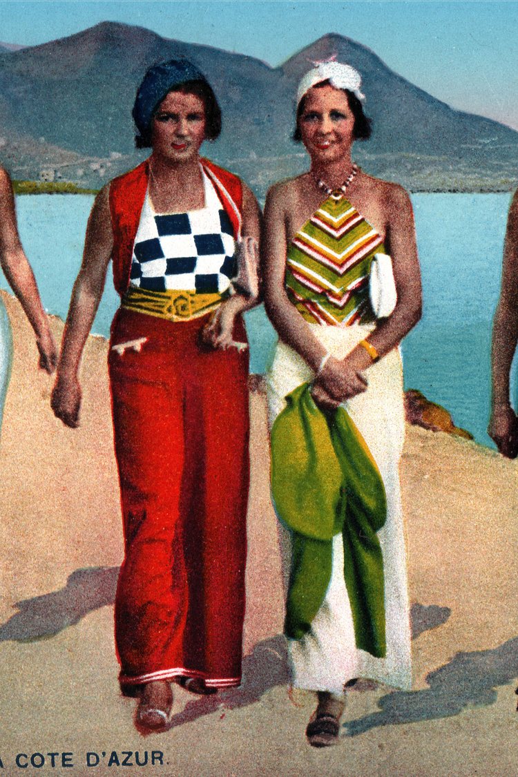Cote d’Azur postcard from 1930s, four women wearing colorful beach pajamas